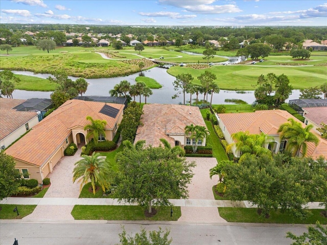 9926 SW Nuova Way, Port Saint Lucie, FL 34986 - aerial perspective of suburban area with a local golf course and a large body of water