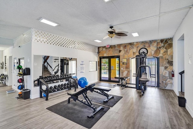 973 Springdale Cir Unit 97-C, Palm Springs, FL 33461 - workout area featuring a ceiling fan, wood finished floors, and baseboards