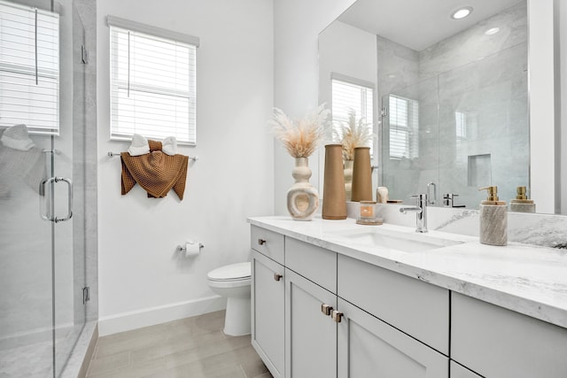 5609 Zestar Ln, The Acreage, FL 33470 - bathroom featuring baseboards, vanity, toilet, a shower stall, and recessed lighting