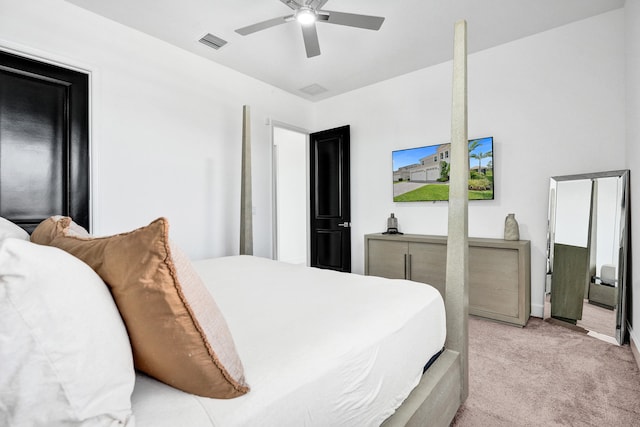 5609 Zestar Ln, The Acreage, FL 33470 - bedroom with light colored carpet and ceiling fan