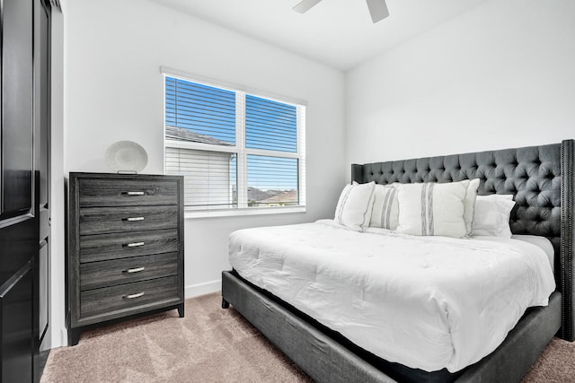 5609 Zestar Ln, The Acreage, FL 33470 - bedroom with carpet floors, baseboards, and ceiling fan