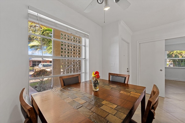 1560 NW 18th Ave Unit 101, Delray Beach, FL 33445 - dining area with a ceiling fan, ornamental molding, and tile patterned flooring