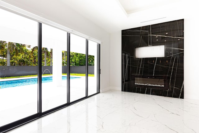 640 Marshall Rd, West Palm Beach, FL 33413 - unfurnished living room with marble tiled flooring