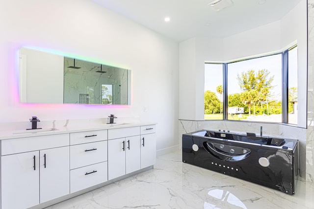 640 Marshall Rd, West Palm Beach, FL 33413 - bathroom featuring double vanity, marble tiled floors, a marble finish shower, a bath, and baseboards