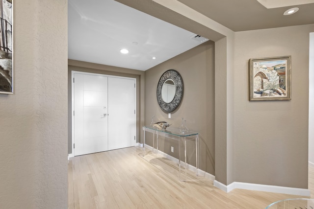 20310 Fairway Oaks Dr Unit 161, Boca Raton, FL 33434 - entrance foyer with wood finished floors, recessed lighting, and a textured wall