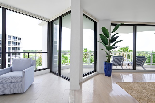 20310 Fairway Oaks Dr Unit 161, Boca Raton, FL 33434 - sunroom / solarium featuring floor to ceiling windows and wood finished floors