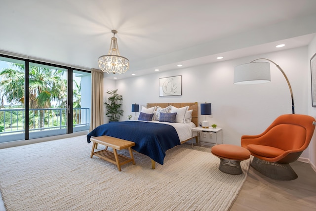 20310 Fairway Oaks Dr Unit 161, Boca Raton, FL 33434 - bedroom with a chandelier, recessed lighting, and wood finished floors