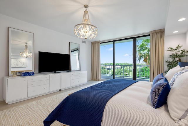 20310 Fairway Oaks Dr Unit 161, Boca Raton, FL 33434 - bedroom with a chandelier, access to exterior, light wood-type flooring, and recessed lighting