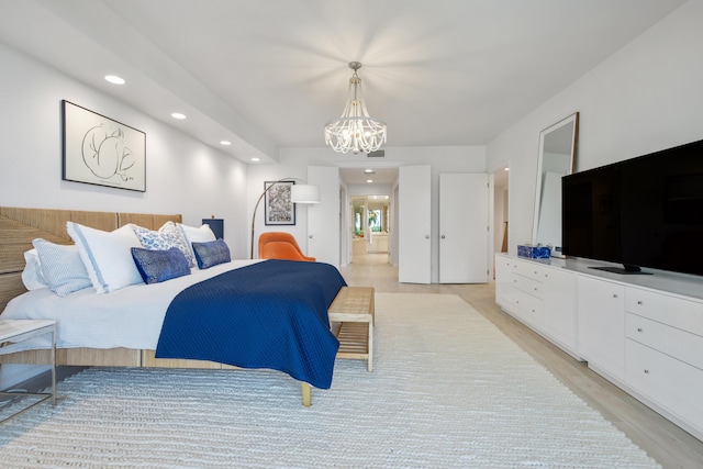 20310 Fairway Oaks Dr Unit 161, Boca Raton, FL 33434 - bedroom featuring recessed lighting, a chandelier, and light wood-style flooring