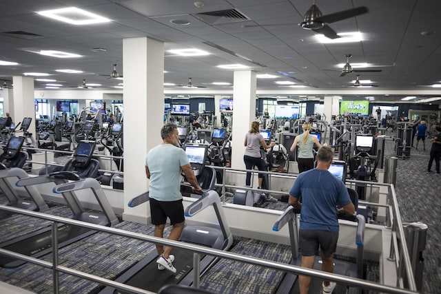 20310 Fairway Oaks Dr Unit 161, Boca Raton, FL 33434 - exercise room with ceiling fan and a drop ceiling