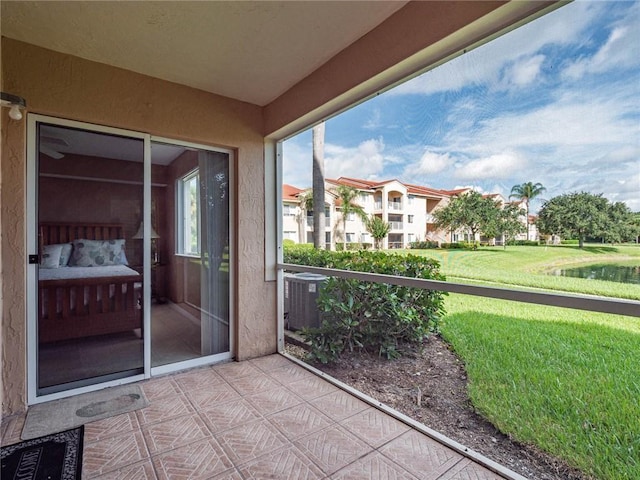 1590 S 42nd Cir Unit 106, Vero Beach, FL 32967 - balcony featuring central air condition unit and a water view