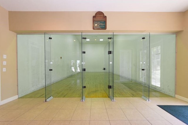 1590 S 42nd Cir Unit 106, Vero Beach, FL 32967 - bathroom with baseboards and tile patterned flooring