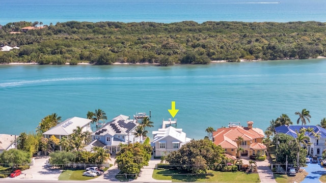 18119 SE Federal Hwy, Tequesta, FL 33469 - aerial view of residential area with a forest and a large body of water