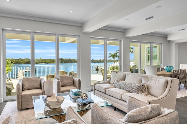 18119 SE Federal Hwy, Tequesta, FL 33469 - living area featuring beamed ceiling, wood finished floors, plenty of natural light, a water view, and recessed lighting
