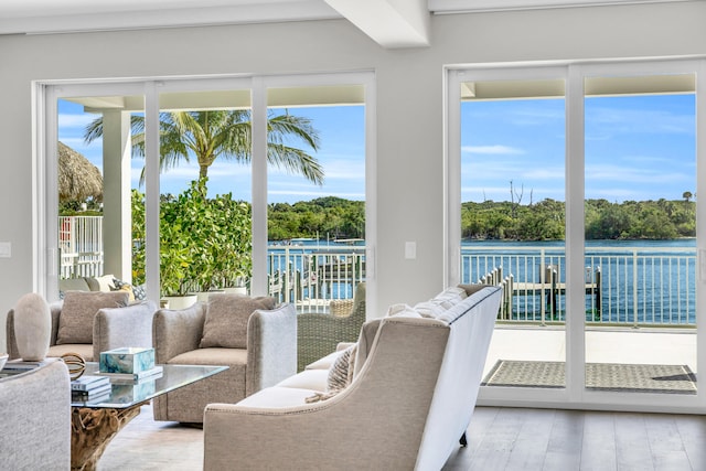 18119 SE Federal Hwy, Tequesta, FL 33469 - sunroom featuring wood finished floors, a water view, and healthy amount of natural light