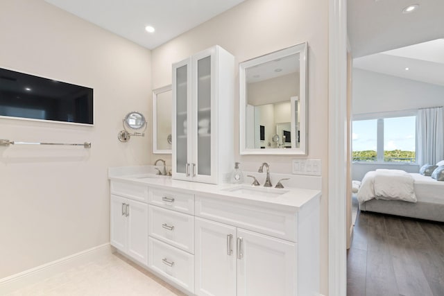 18119 SE Federal Hwy, Tequesta, FL 33469 - full bathroom featuring ensuite bath, double vanity, recessed lighting, wood finished floors, and baseboards
