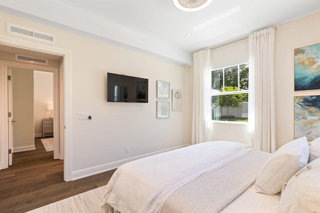 18119 SE Federal Hwy, Tequesta, FL 33469 - bedroom featuring dark wood-style floors and baseboards