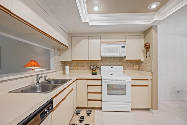 5200 SE Seascape Way Unit 201, Stuart, FL 34997 - kitchen featuring white appliances, a sink, light tile patterned flooring, light countertops, and tasteful backsplash