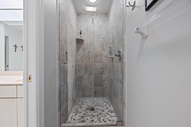 5200 SE Seascape Way Unit 201, Stuart, FL 34997 - bathroom featuring a stall shower and vanity