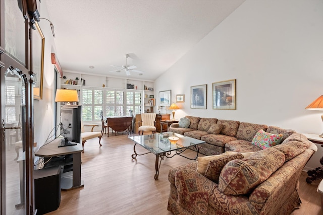 5200 SE Seascape Way Unit 201, Stuart, FL 34997 - living room featuring ceiling fan, light wood-style flooring, and high vaulted ceiling