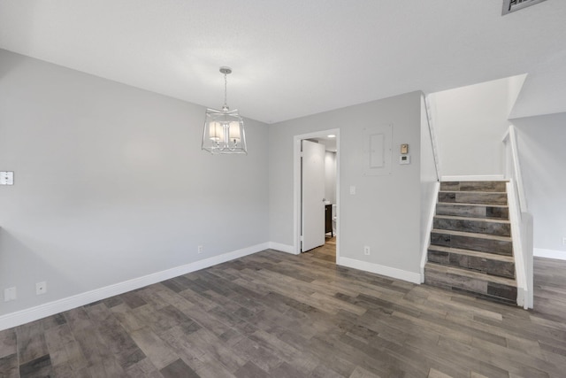 3665 Sliver Lace Ln Unit 80, Boynton Beach, FL 33436 - spare room with baseboards, stairs, dark wood-type flooring, and a chandelier