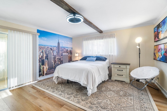 2020 Lake Osborne Dr Unit 10, Lake Worth, FL 33461 - bedroom featuring wood finished floors, beam ceiling, ornamental molding, and a city view