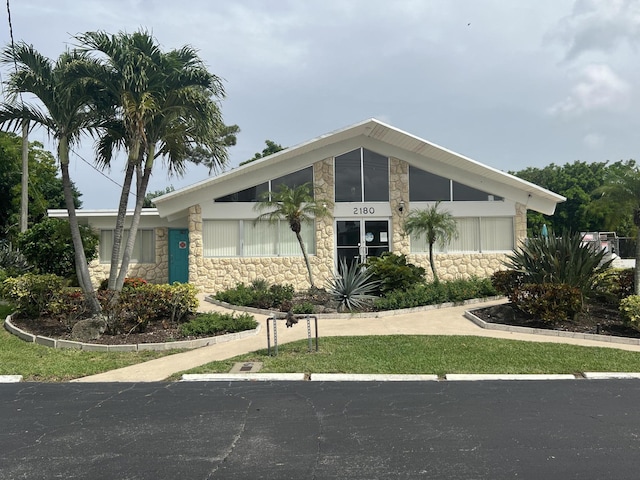 2020 Lake Osborne Dr Unit 10, Lake Worth, FL 33461 - view of front facade with stone siding
