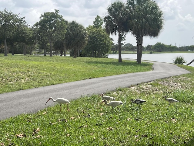 2020 Lake Osborne Dr Unit 10, Lake Worth, FL 33461 - view of asphalt street featuring a water view