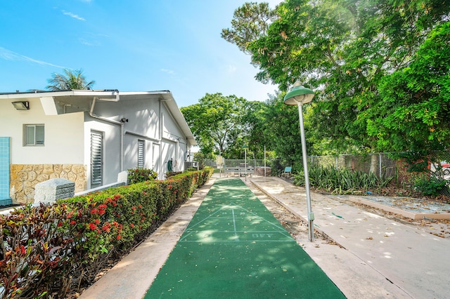2020 Lake Osborne Dr Unit 10, Lake Worth, FL 33461 - surrounding community with shuffleboard