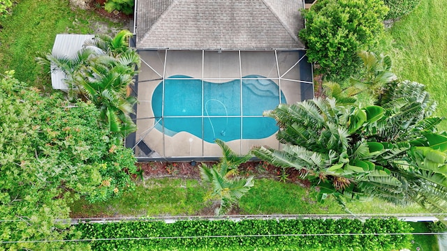 515 SE Nome Dr, Port Saint Lucie, FL 34984 - aerial view of property and surrounding area featuring a pool area