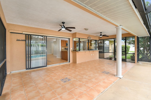 515 SE Nome Dr, Port Saint Lucie, FL 34984 - view of patio featuring ceiling fan and a sink