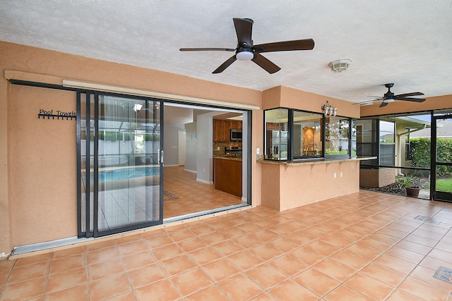 515 SE Nome Dr, Port Saint Lucie, FL 34984 - view of patio / terrace featuring a ceiling fan