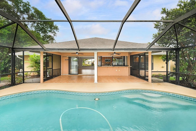515 SE Nome Dr, Port Saint Lucie, FL 34984 - swimming pool with a ceiling fan, a patio, and a lanai