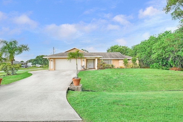 515 SE Nome Dr, Port Saint Lucie, FL 34984 - single story home featuring a front yard, concrete driveway, and an attached garage