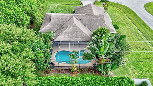 515 SE Nome Dr, Port Saint Lucie, FL 34984 - view from above of property with a pool area