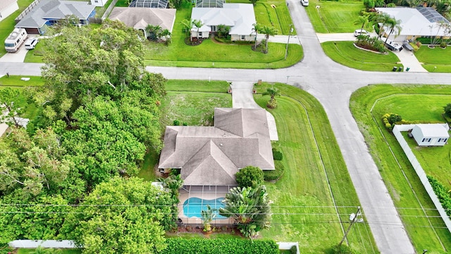 515 SE Nome Dr, Port Saint Lucie, FL 34984 - aerial view of residential area featuring a pool area