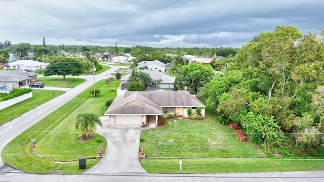 515 SE Nome Dr, Port Saint Lucie, FL 34984 - aerial perspective of suburban area