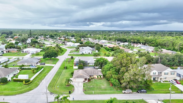 515 SE Nome Dr, Port Saint Lucie, FL 34984 - aerial perspective of suburban area