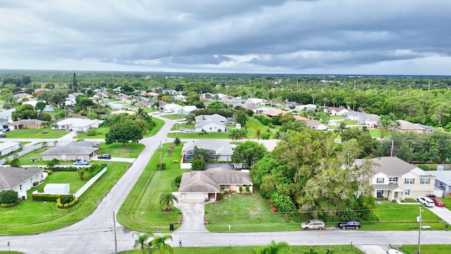 515 SE Nome Dr, Port Saint Lucie, FL 34984 - aerial perspective of suburban area