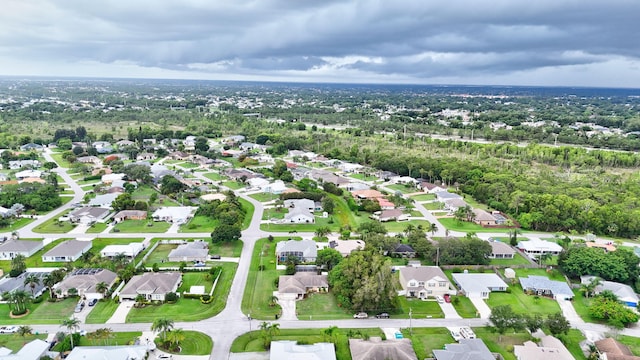 515 SE Nome Dr, Port Saint Lucie, FL 34984 - aerial view of property's location featuring nearby suburban area