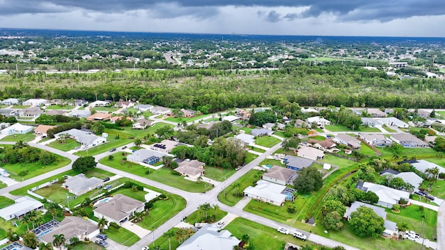 515 SE Nome Dr, Port Saint Lucie, FL 34984 - aerial overview of property's location with nearby suburban area