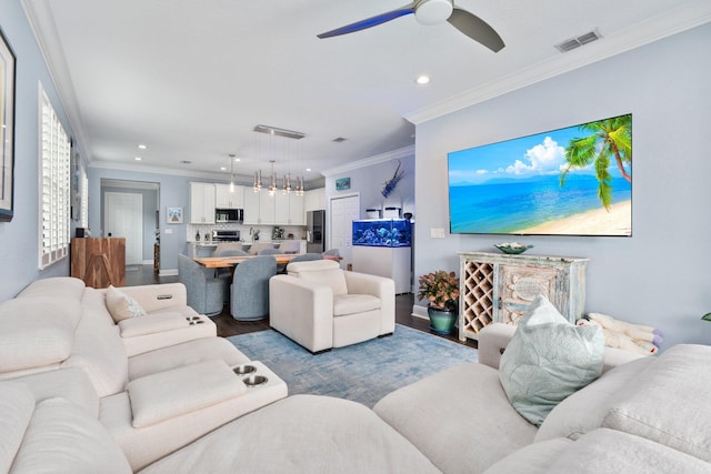 260 SE Via Visconti, Port Saint Lucie, FL 34952 - living area featuring crown molding, recessed lighting, a ceiling fan, and wood finished floors