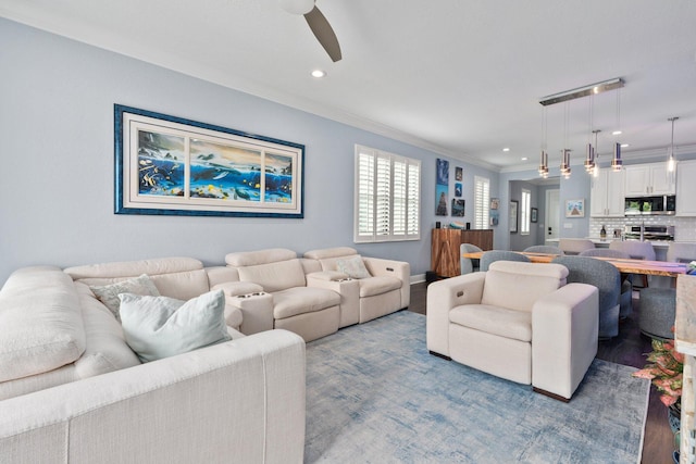260 SE Via Visconti, Port Saint Lucie, FL 34952 - living area with ornamental molding, wood finished floors, a ceiling fan, and recessed lighting