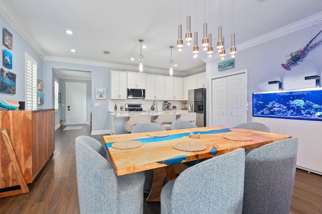 260 SE Via Visconti, Port Saint Lucie, FL 34952 - dining room with crown molding, dark wood-style floors, recessed lighting, and baseboards