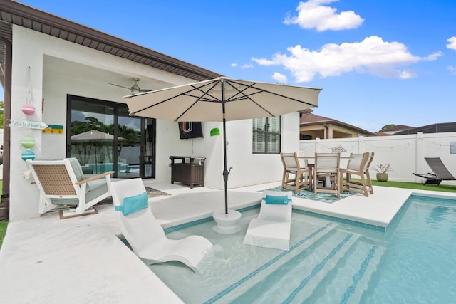 260 SE Via Visconti, Port Saint Lucie, FL 34952 - view of pool featuring a patio, outdoor dining space, and a ceiling fan