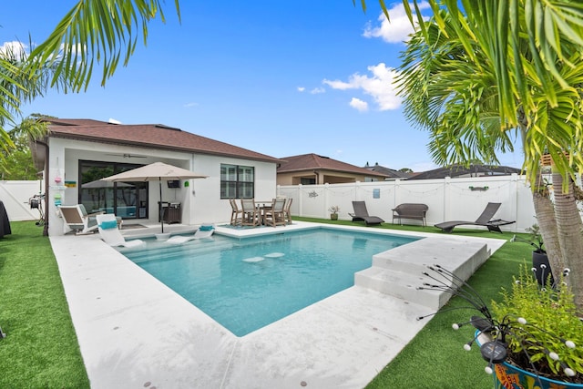 260 SE Via Visconti, Port Saint Lucie, FL 34952 - view of pool featuring outdoor dining area, a patio, and an outdoor hangout area