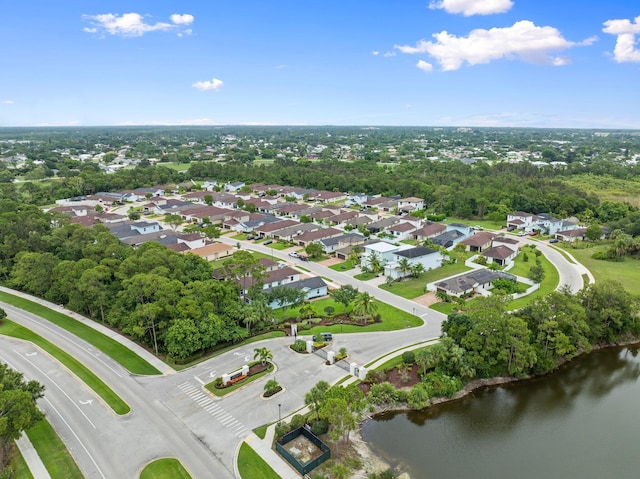 260 SE Via Visconti, Port Saint Lucie, FL 34952 - aerial view of residential area featuring a nearby body of water and a tree filled landscape
