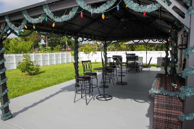 1122 SW California Blvd SW, Port Saint Lucie, FL 34953 - view of patio featuring outdoor dining area and a gazebo