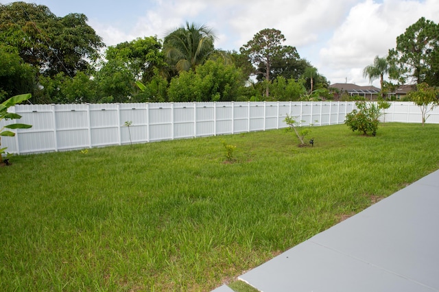 1122 SW California Blvd SW, Port Saint Lucie, FL 34953 - view of yard
