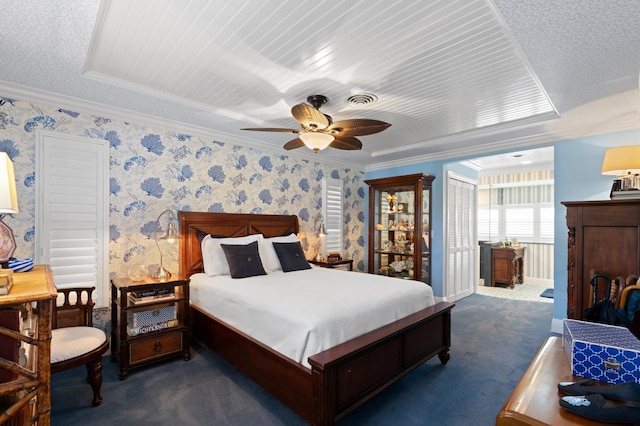 4633 Holly Dr, Palm Beach Gardens, FL 33418 - bedroom with dark colored carpet, crown molding, a ceiling fan, and wallpapered walls